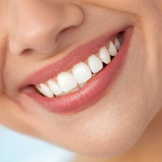 Bright smile after teeth whitening treatment