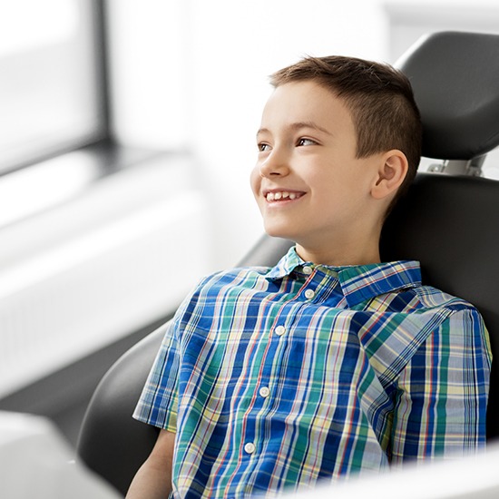 Little boy smiling after pulp therapy