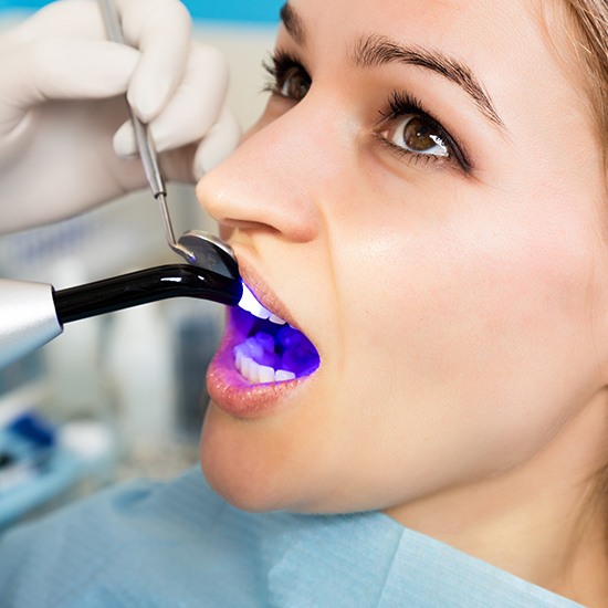 Woman receiving cosmetic dental bonding