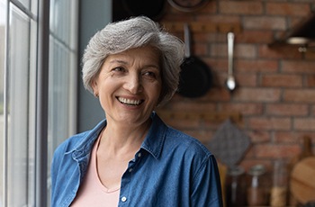 Woman smiling with dentures