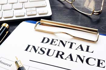 Insurance paperwork for the cost of dentures in Arvada