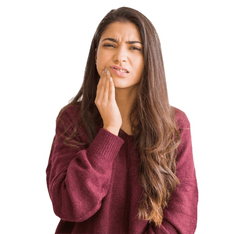 Woman in red sweater holding jaw in pain