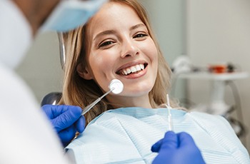 smiling patient relaxed and ready for treatment 