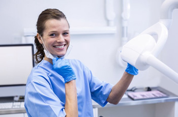 Dental hygienist smiles