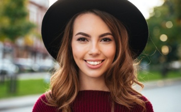 Woman with gorgeous smile after cosmetic dentistry