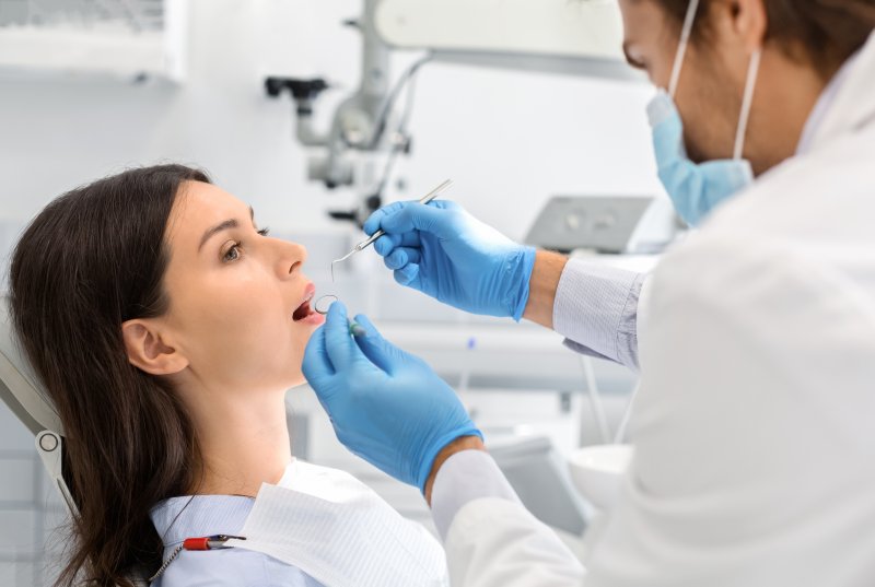 woman receiving dental checkup