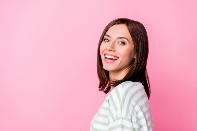 woman smiling with veneers in Arvada